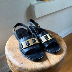 Prada Gold Buckle Mules